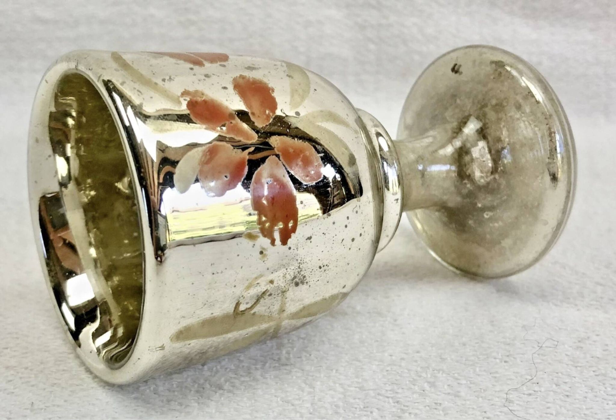 Painted blown glass egg cup with mercury gilding, 19th century.