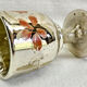 Painted blown glass egg cup with mercury gilding, 19th century.