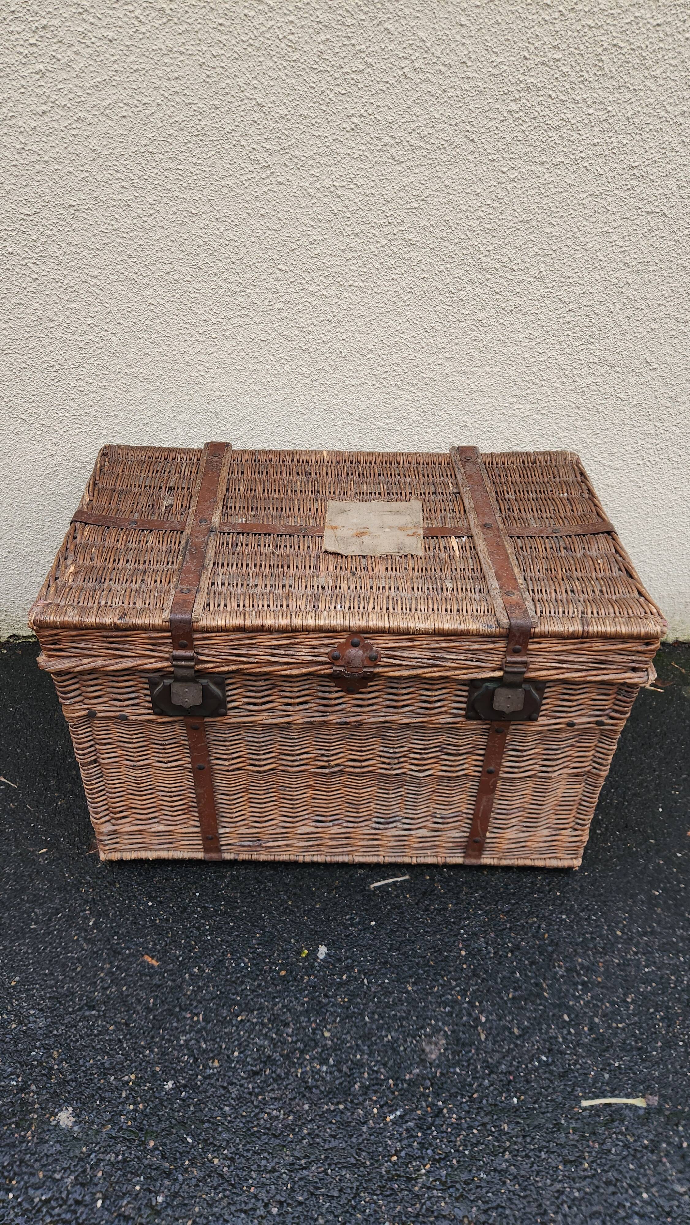Antique vintage rattan and wicker travel trunk from the 1900s