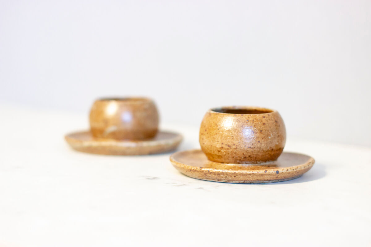 2 stoneware shells, unidentified signature