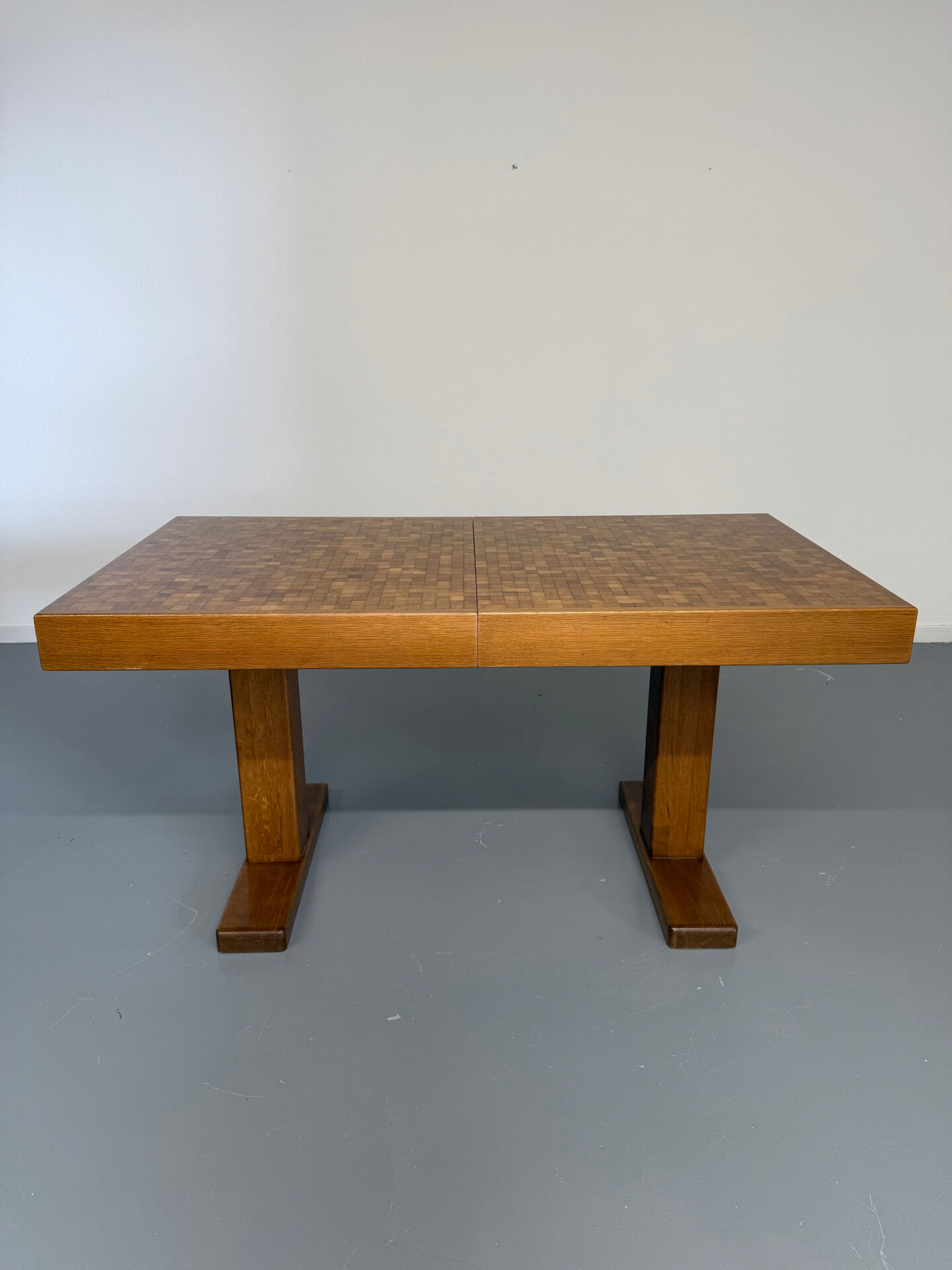 Wooden marquetry dining table designed by Dieter Waeckerlin from the 1960s.