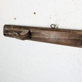 Handcrafted wall coat rack in raw wood