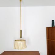 Suspension réglable avec contrepoids par Vereinigte Werkstätten München
