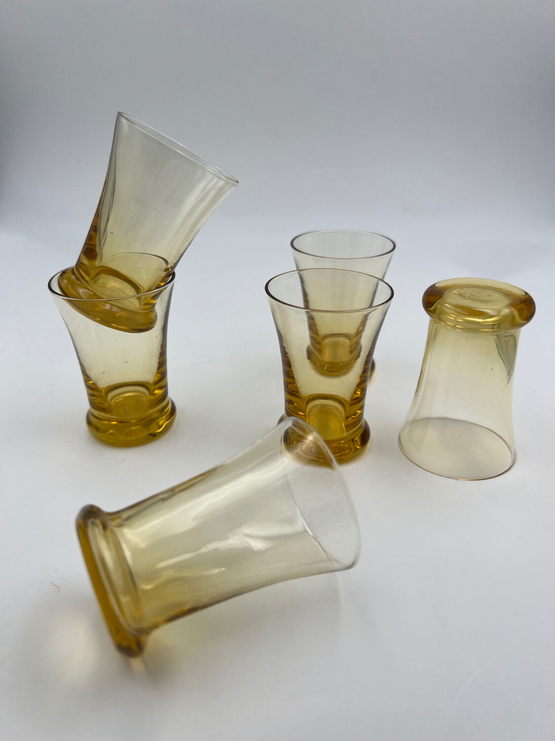 Six yellow glass shooting glasses