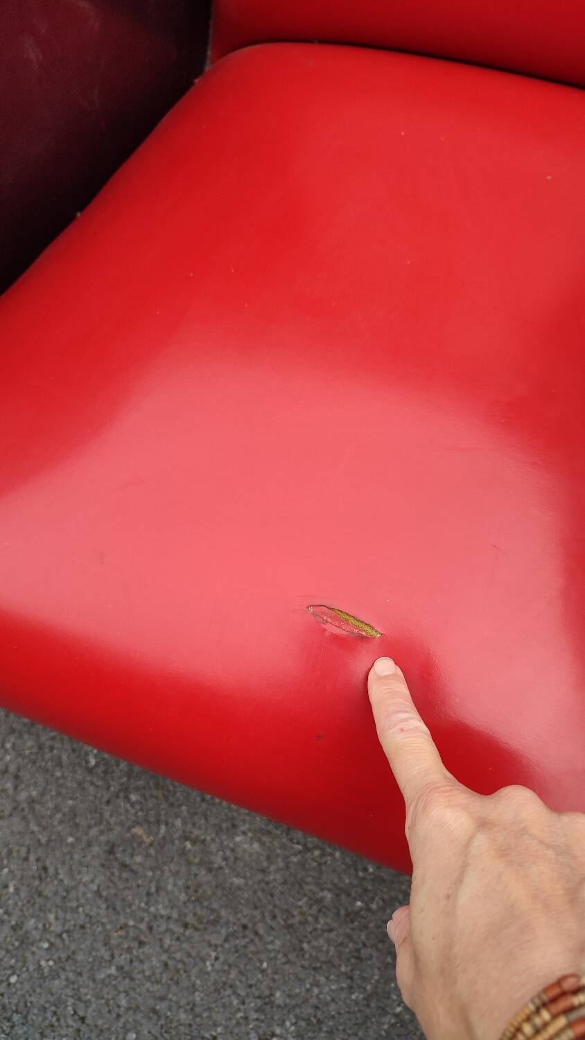 Pair of red and black faux leather armchairs