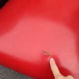 Pair of red and black faux leather armchairs