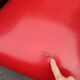 Paire de fauteuils en skaï rouge et noir