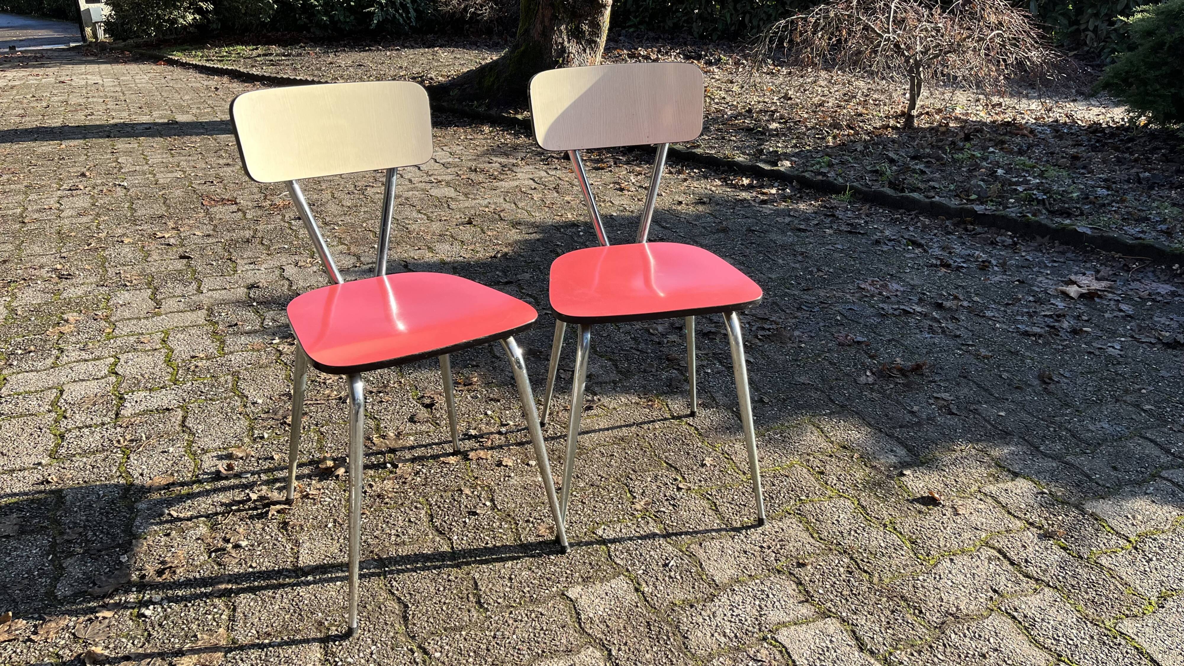 Red and cream Formica kitchen chairs