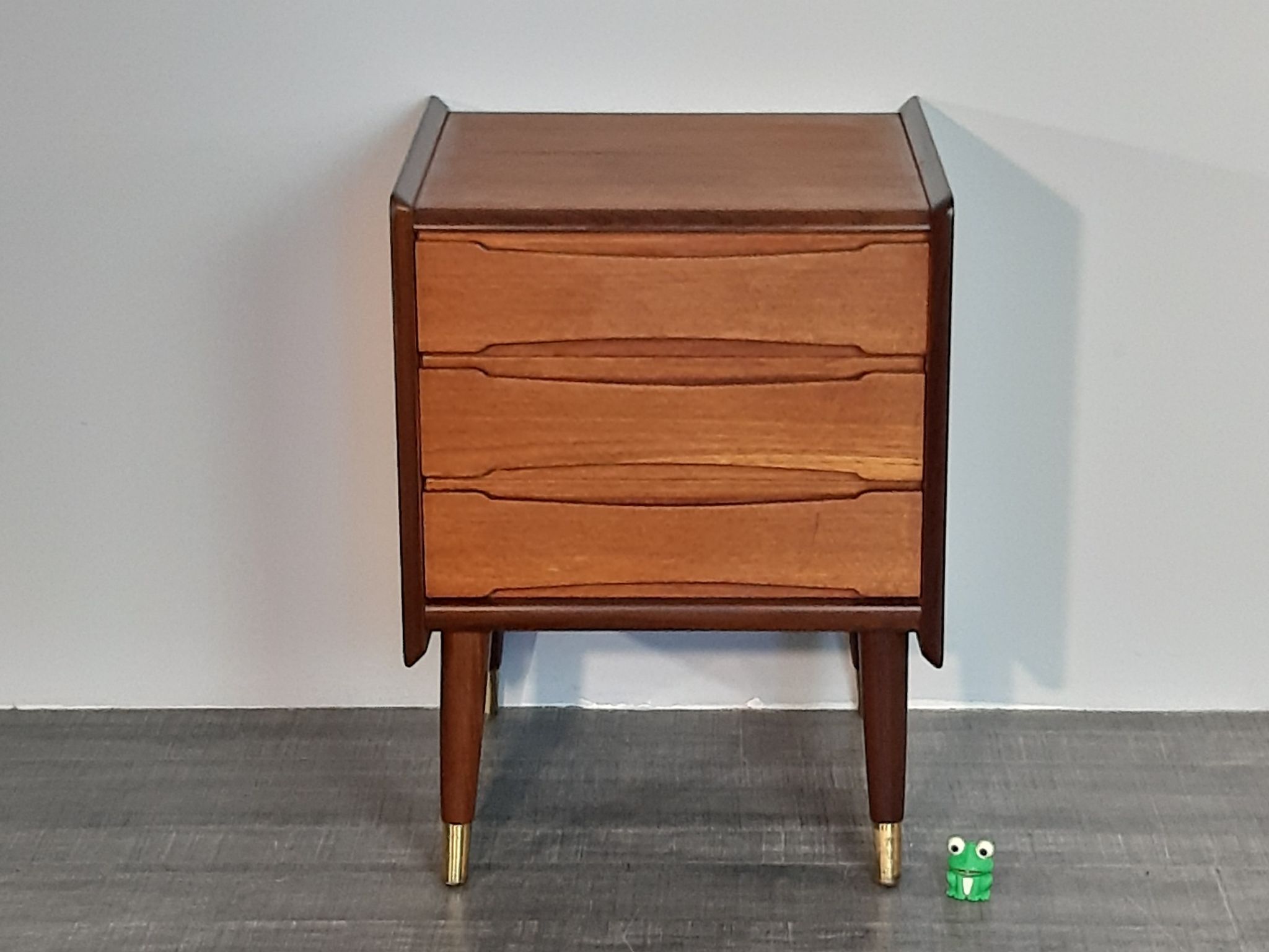 Norwegian bedside table with 3 drawers, teak and brass clogs