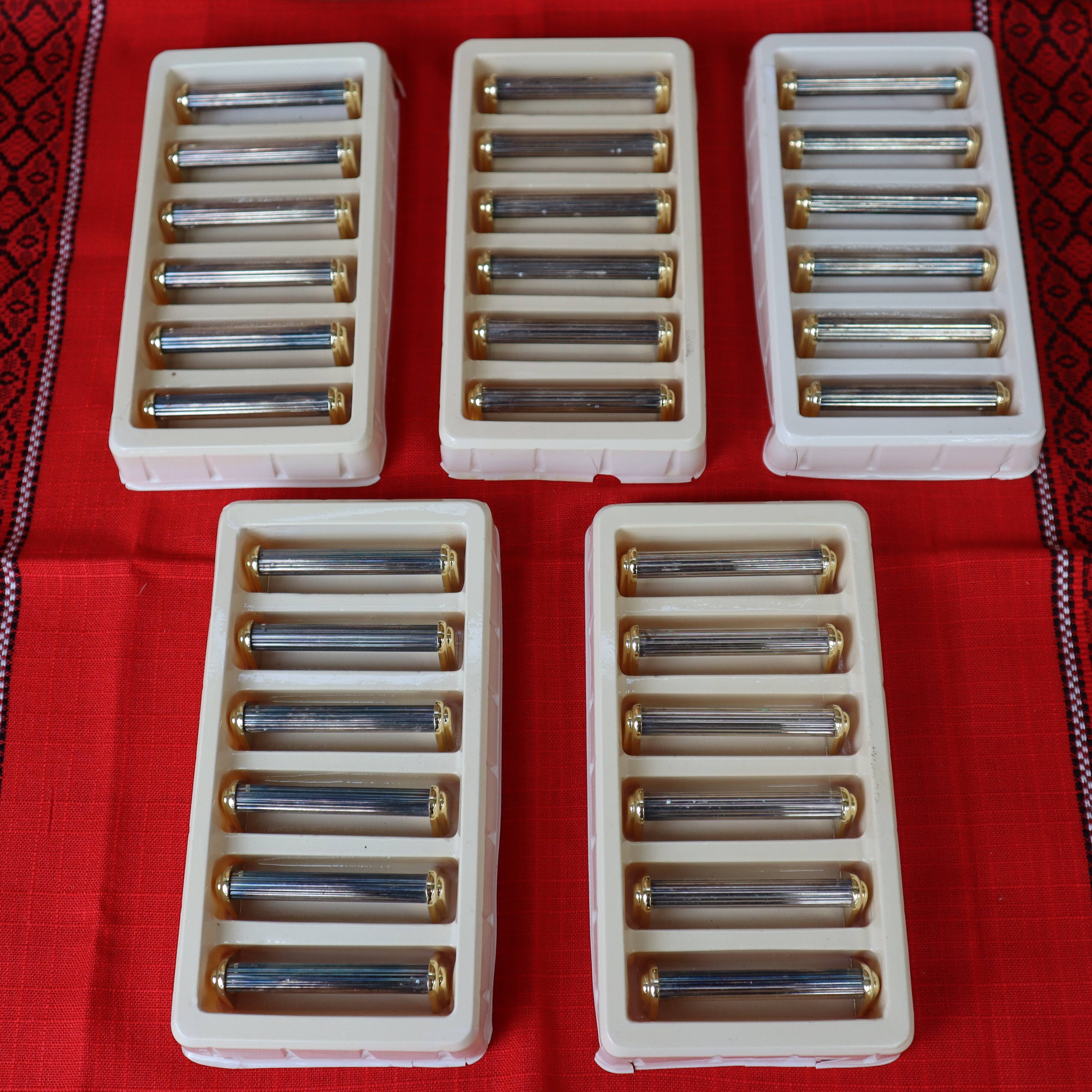 Set of 6 silver and gold metal knife holders