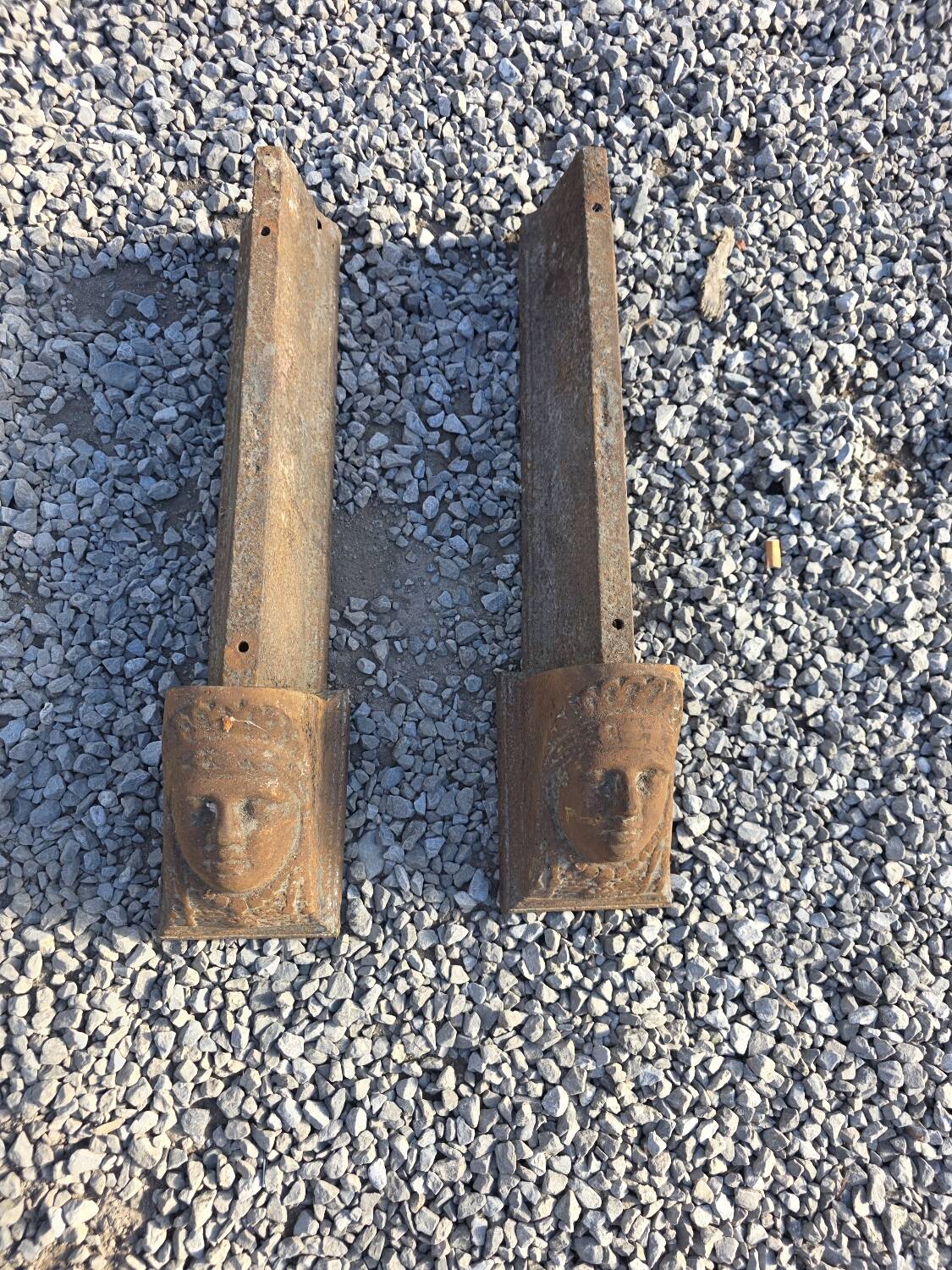 Pair of cast iron andirons from the 19th century.