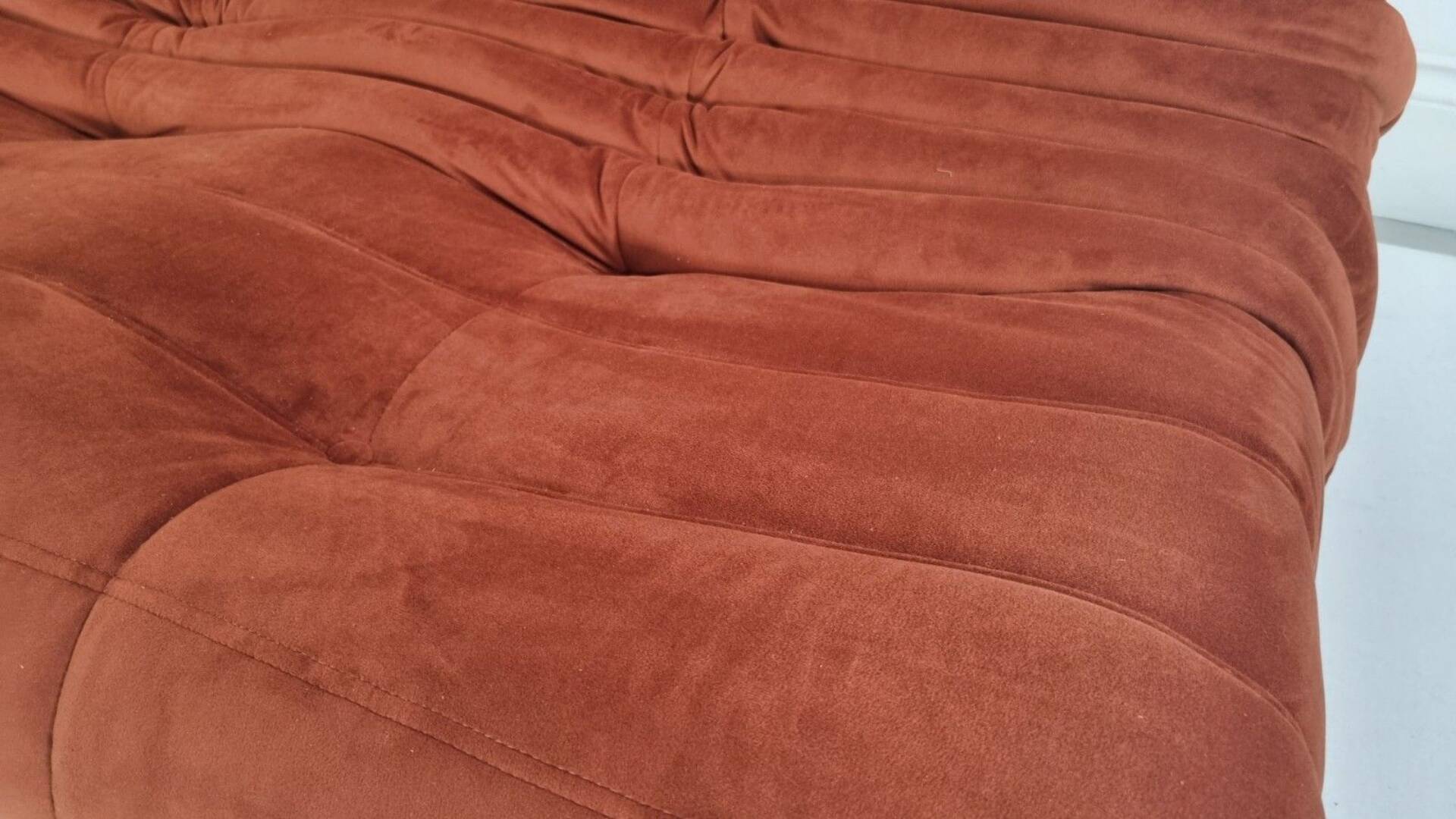 Ligne Roset Pair of 3-seater Togo sofas in rust velvet