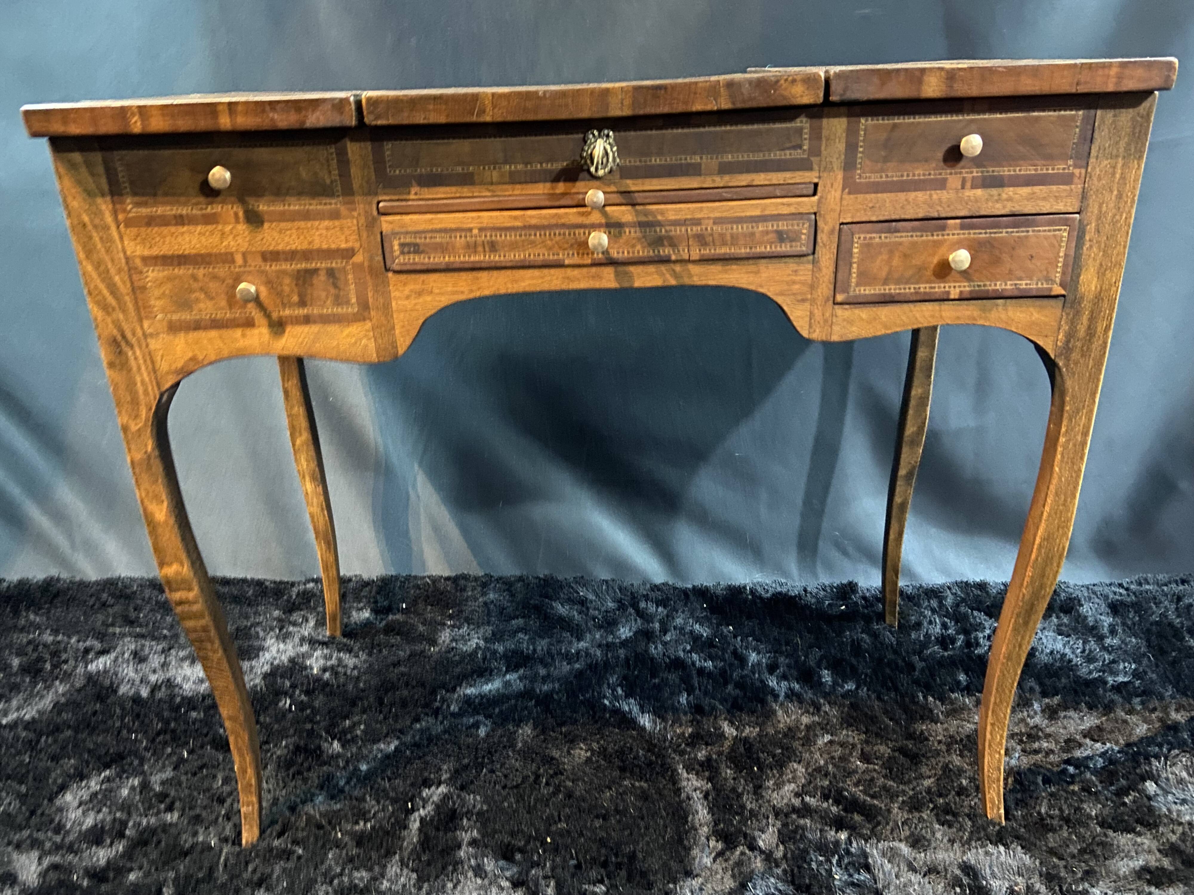 19th-century hairdresser with marquetry decoration on oak in the Louis XV Transition style.