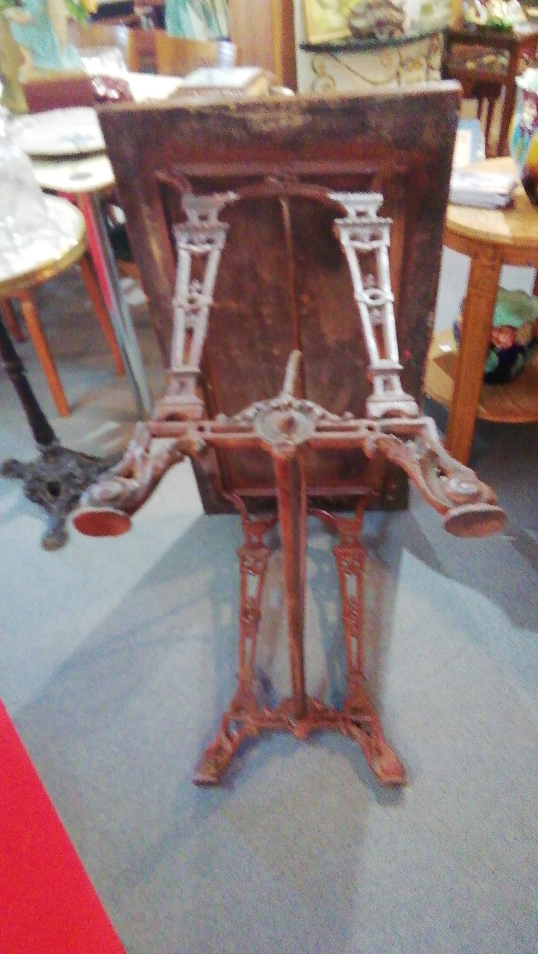 Bistro table over wood cast iron legs