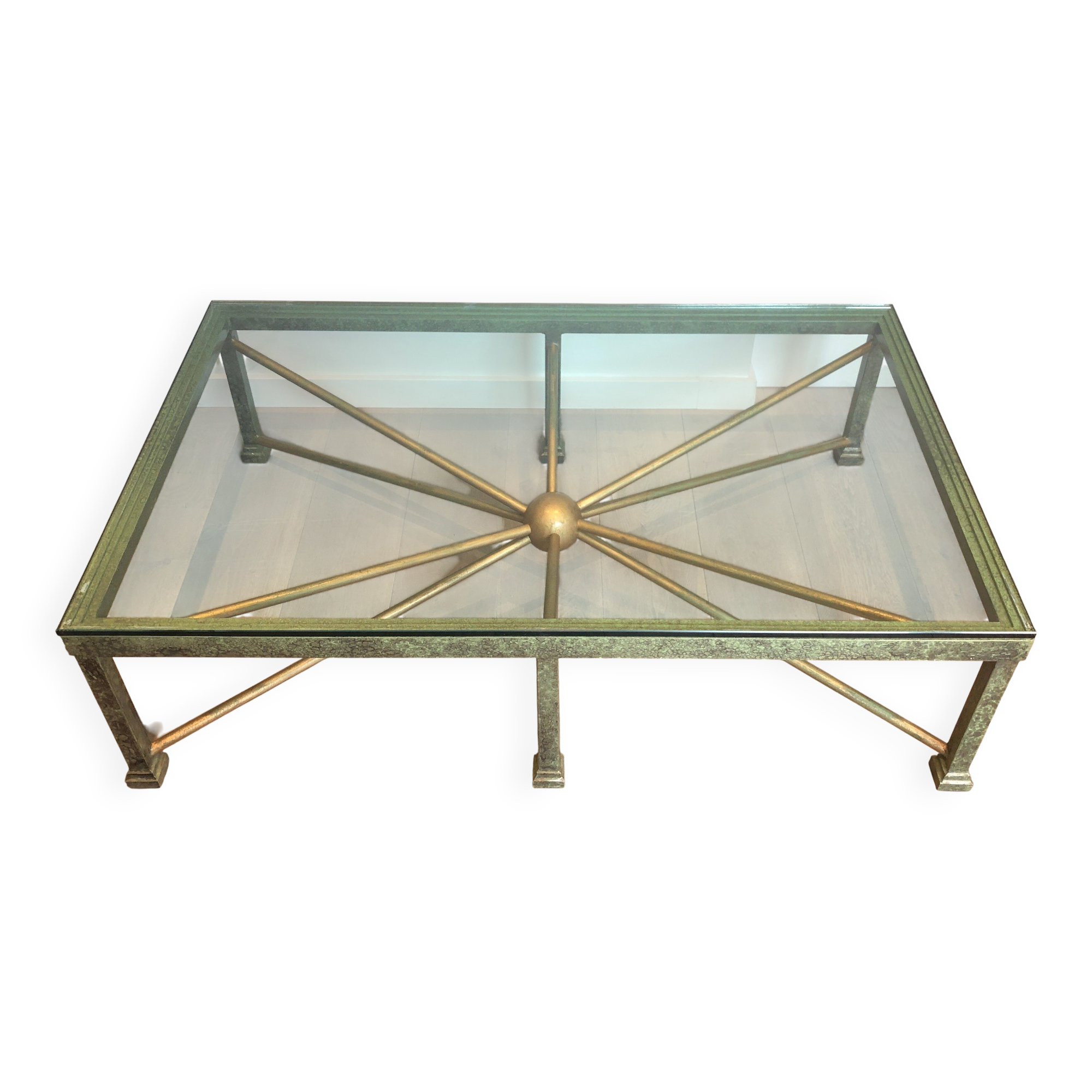 Importante table basse en acier et fer forgé patinée et dorée