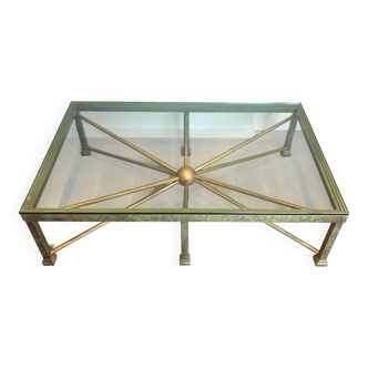 Important coffee table in patinated and gilded steel and wrought iron.