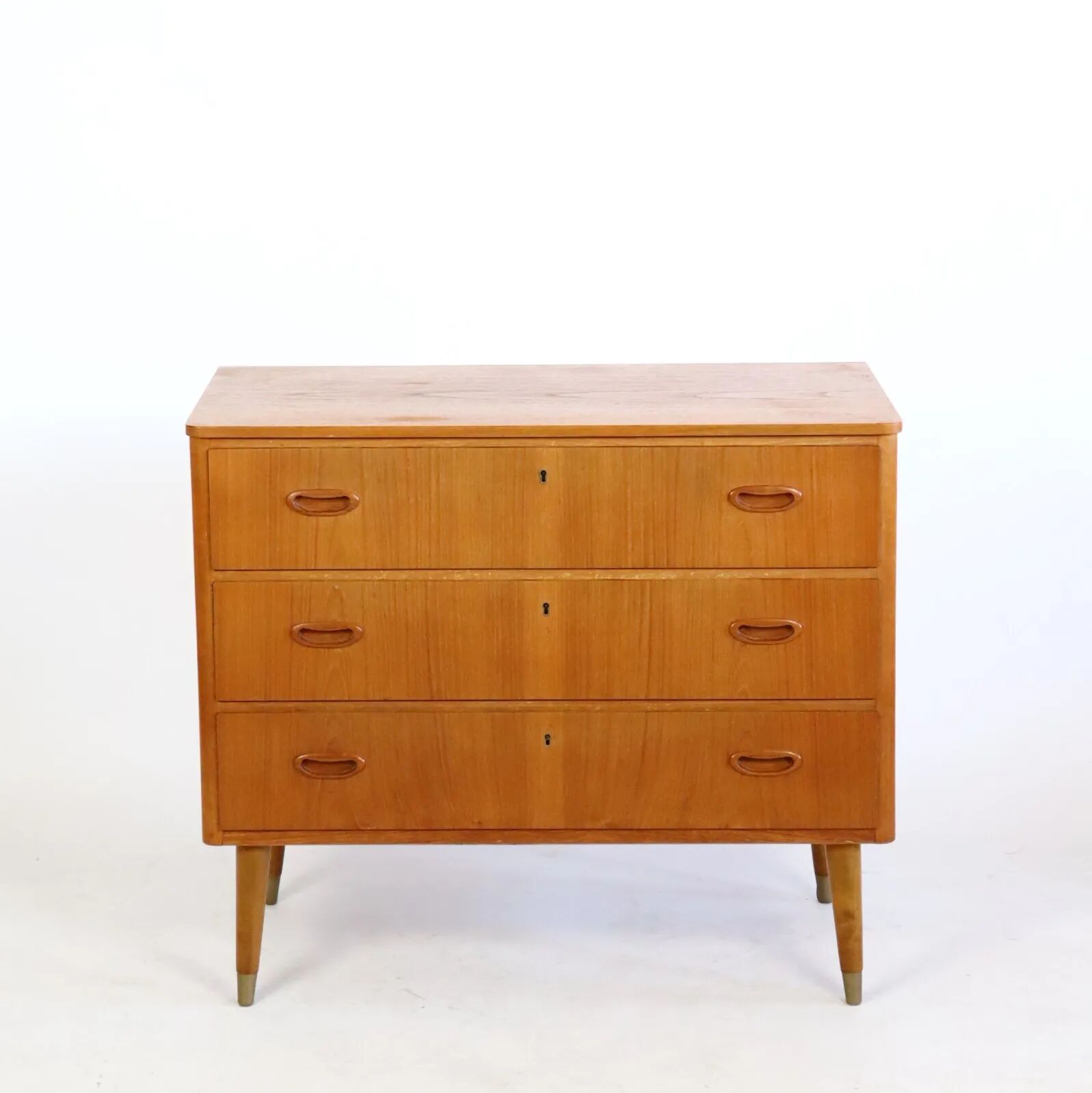 Commode en teck trois tiroirs