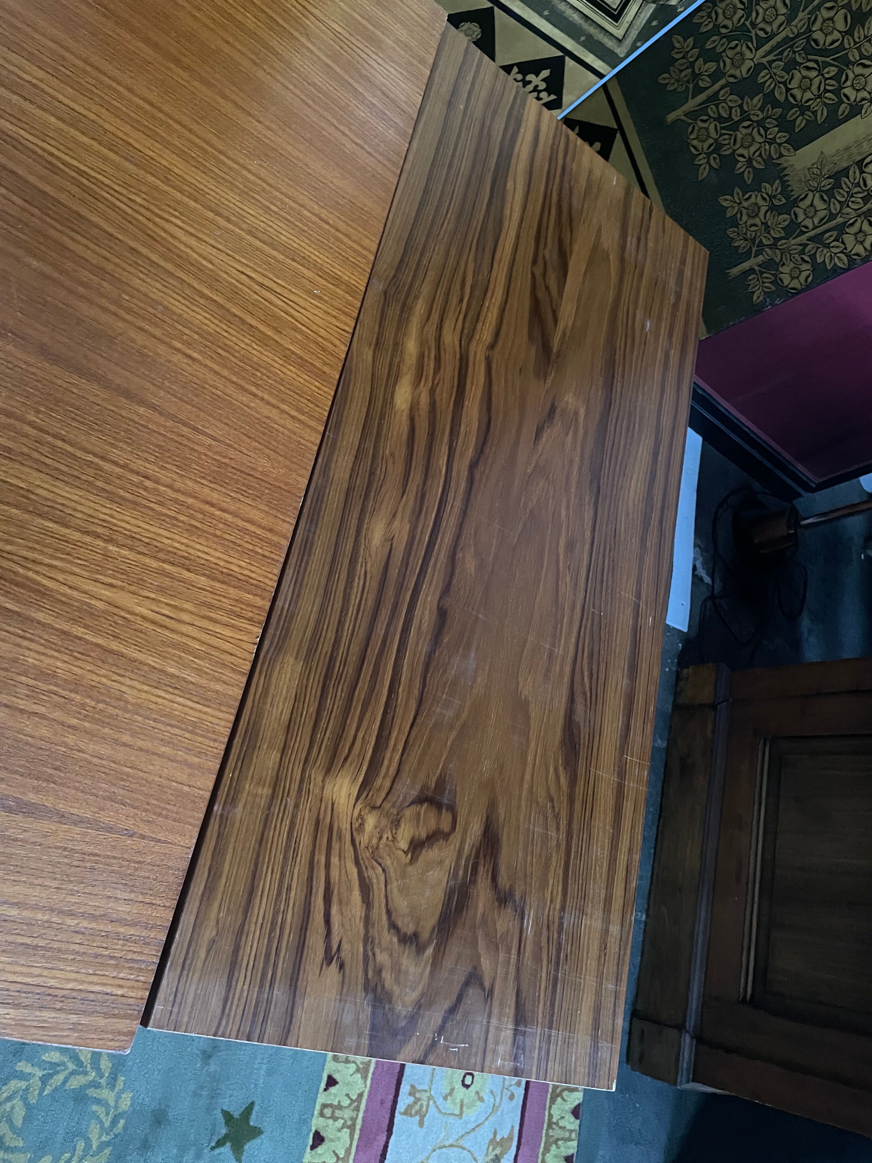 Scandinavian dining table with built-in extensions