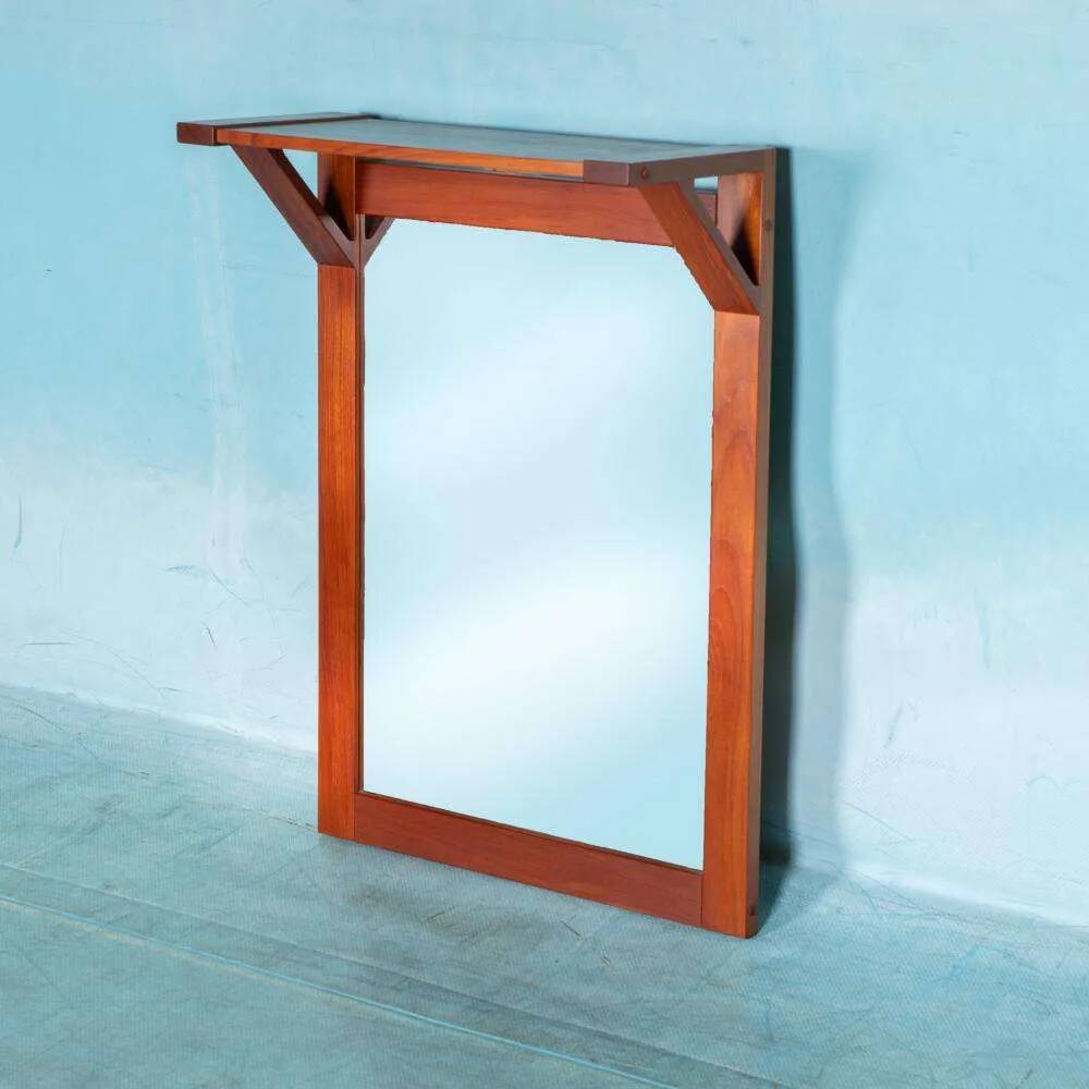 Danish teak mirror with shelf for hats from the 1960s.