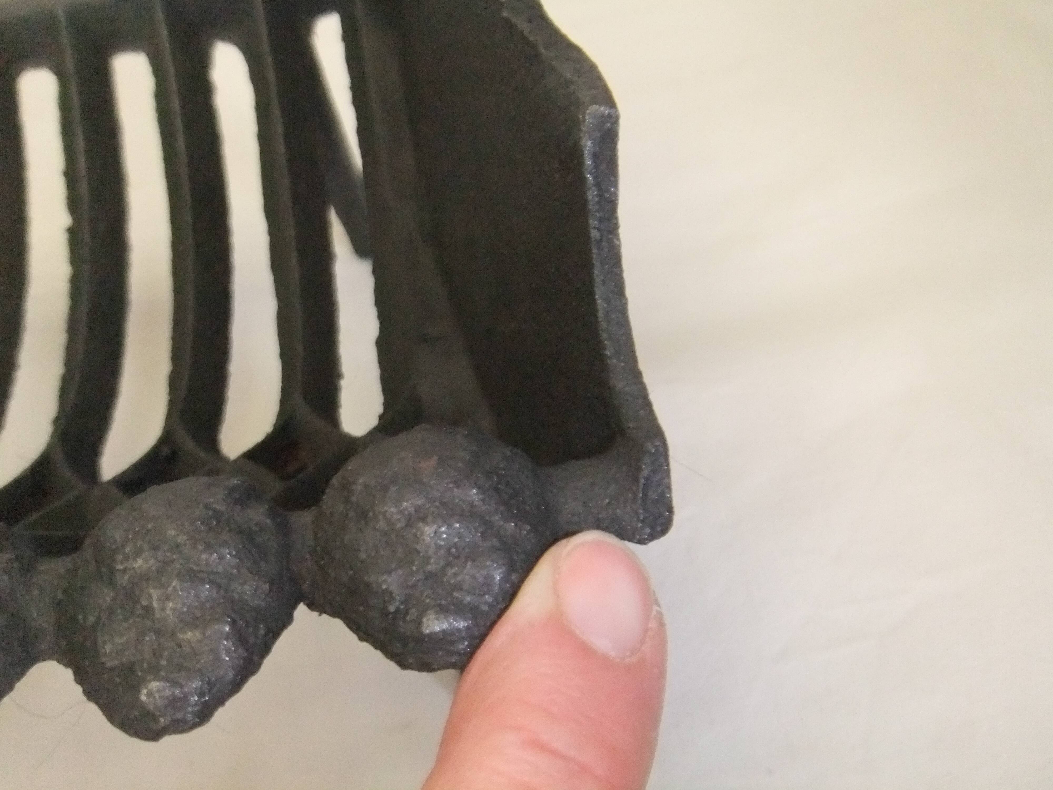 Old cast iron log holder andiron fireplace cornucopia pine cone