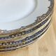 6 fine porcelain dinner plates by F. Legrand, 1920