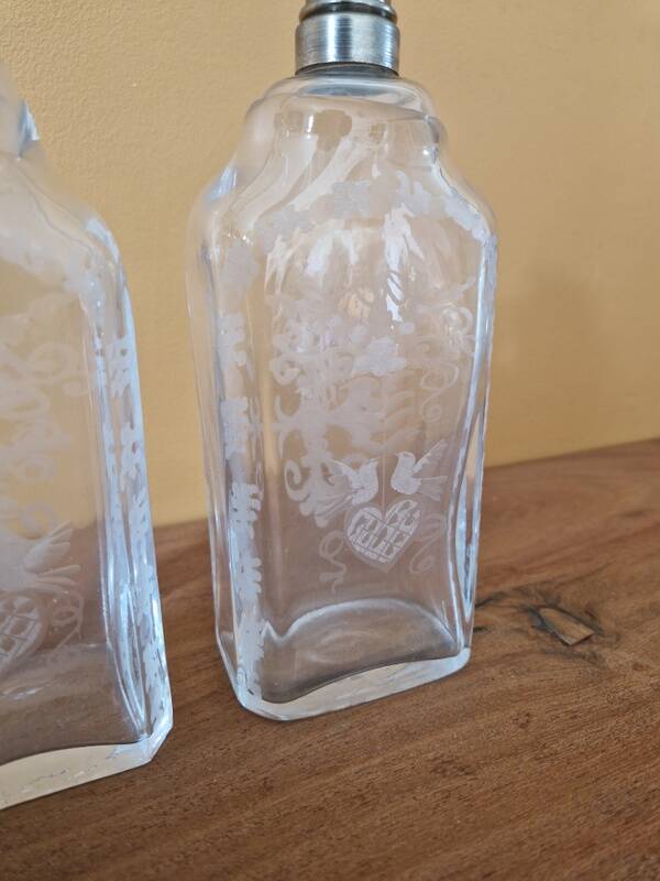 Pair of old engraved and frosted glass bottle vases.
