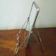 Two-foot barber mirror, suspension mode, beveled, chrome metal - 70s -