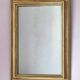 Miroir ancien en bois doré et cuivré
