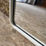 White tubular metal frame mirror