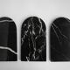 Small curved black marble plate