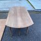 Renovated Louis Philippe round extendable dining table with leaves from the 18th century.