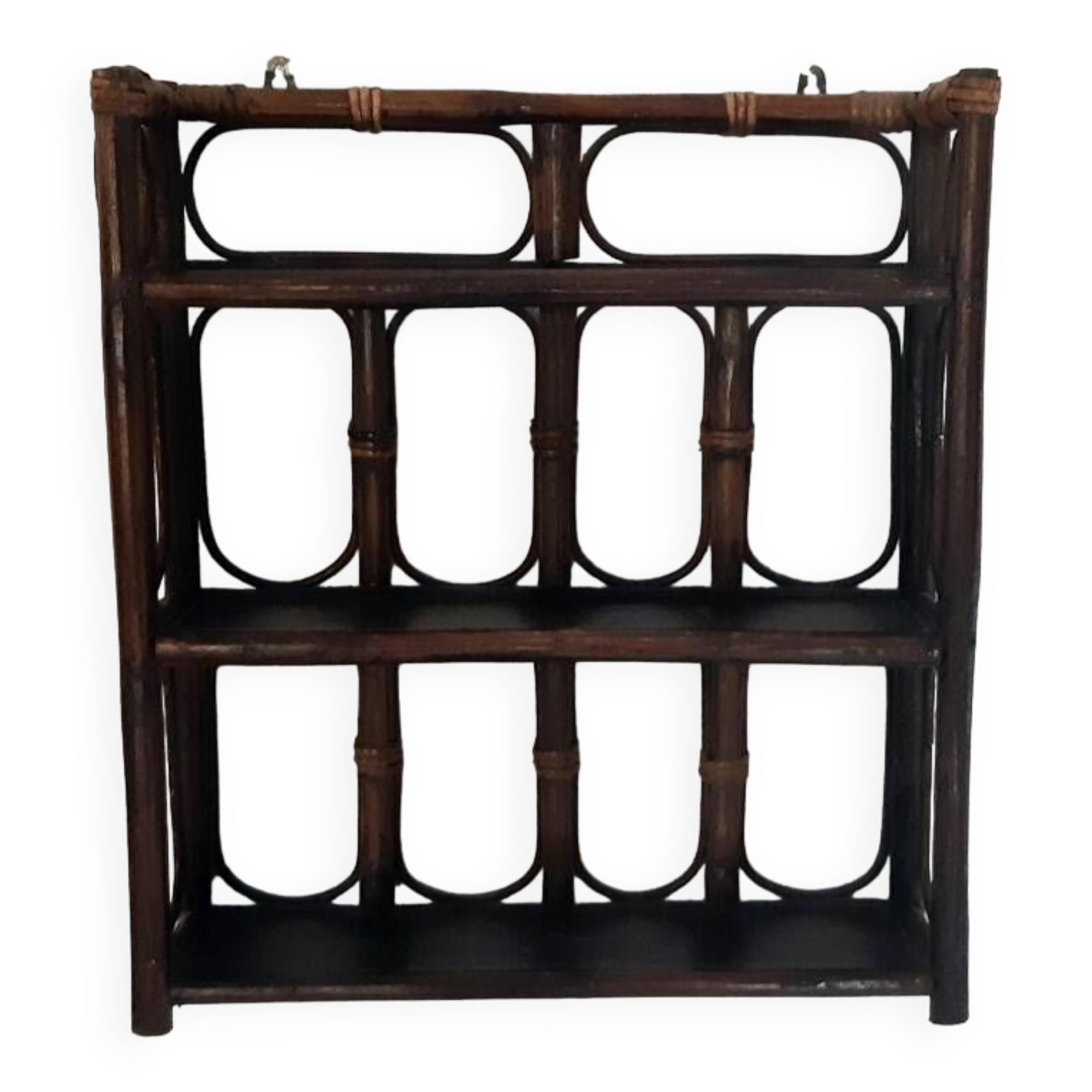 Rattan wall shelf from the 70s.