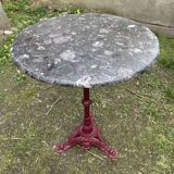 Bistro table with cast iron and marble legs