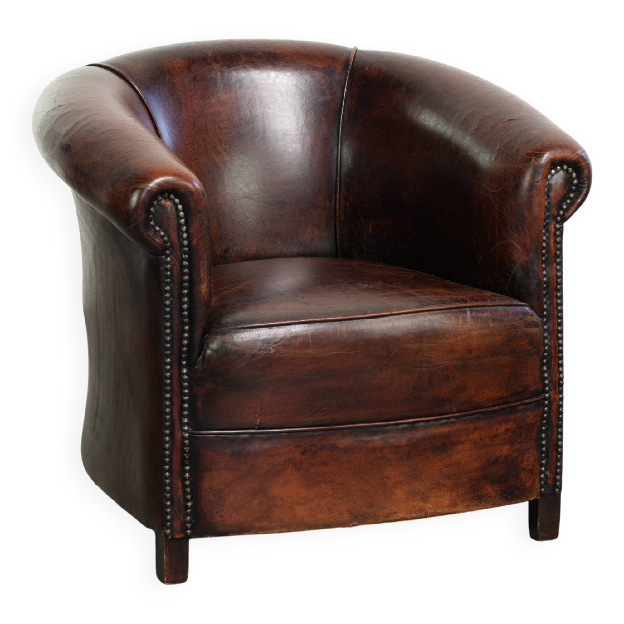 Vintage sheepskin club armchair with beautiful colours and a subtle size