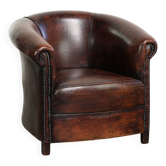 Vintage sheepskin club armchair with beautiful colours and a subtle size