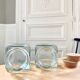 Pair of square jars in tinted glass and corks