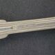 Set of 7 silver-plated dessert spoons with a bi-lobed filet pattern.