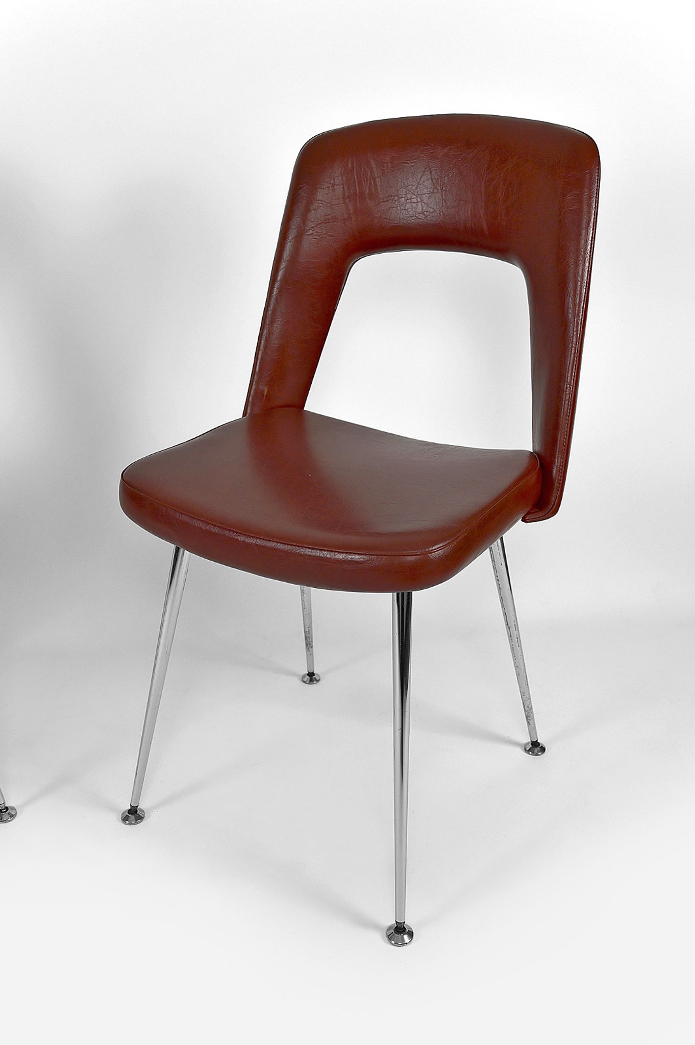 Pair of chairs in chrome and skaï, circa 1960