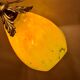 Golden steel lamp, with tulip old marbled yellow glass paste,