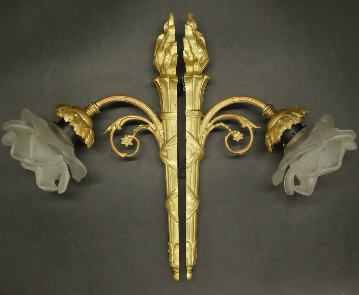 Pair of single-light wall sconces in the Louis XVI torch style - gilded bronze