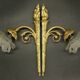 Pair of single-light wall sconces in the Louis XVI torch style - gilded bronze