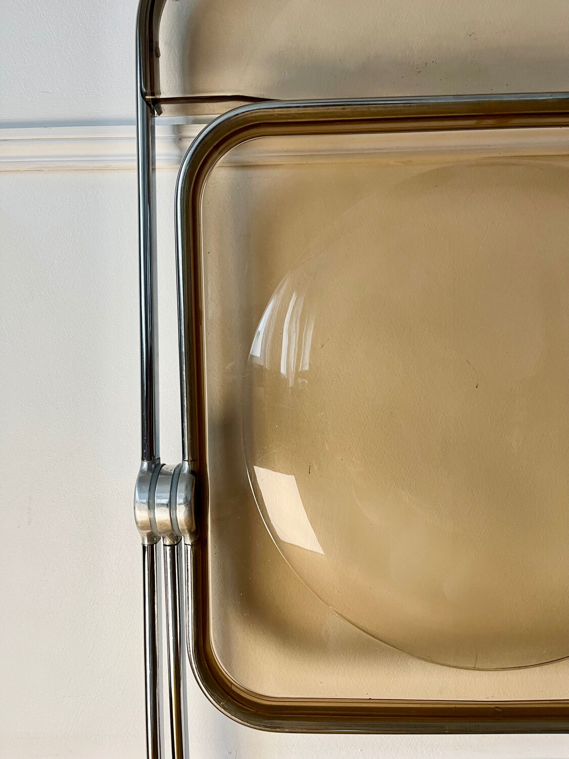 Plia folding chair by Giancarlo Piretti Castelli