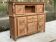 Buffet 2 bodies in raw solid oak, renovated in Breton style.