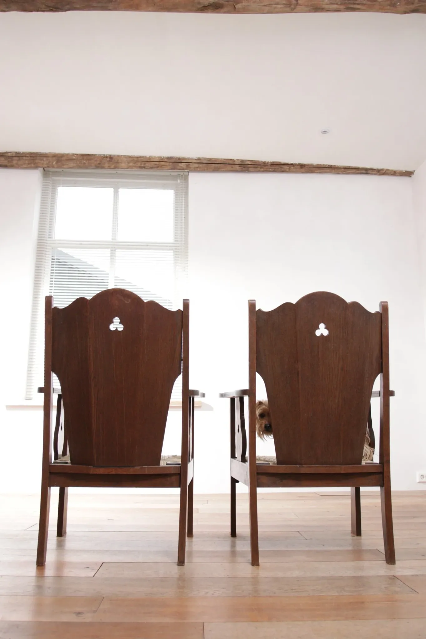 Pair of low Brutalist oak lounge chairs with new rush seats – circa 1935