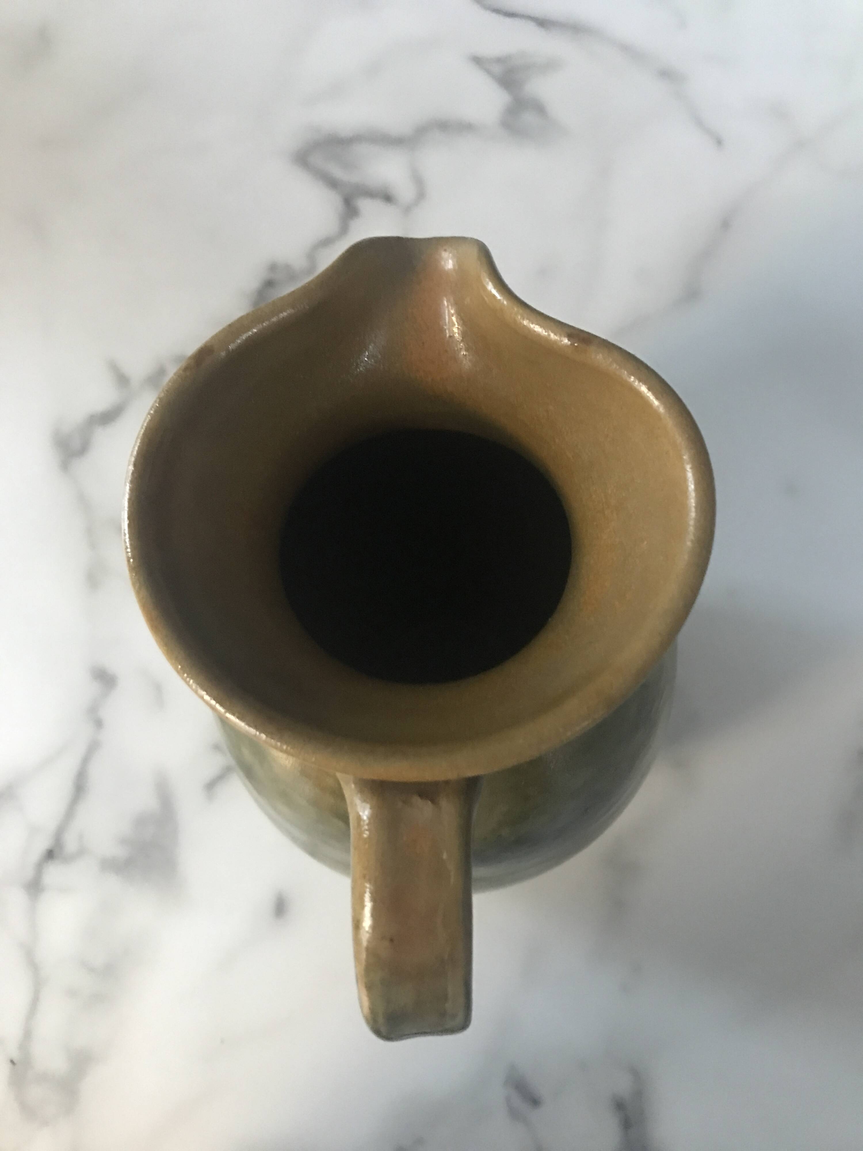 Spotted enamel jug