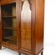 Art Deco showcase bookcase in carved walnut, France, circa 1925