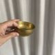 Empty pocket ensemble and bowl in solid brass signed Giò Lanciani.