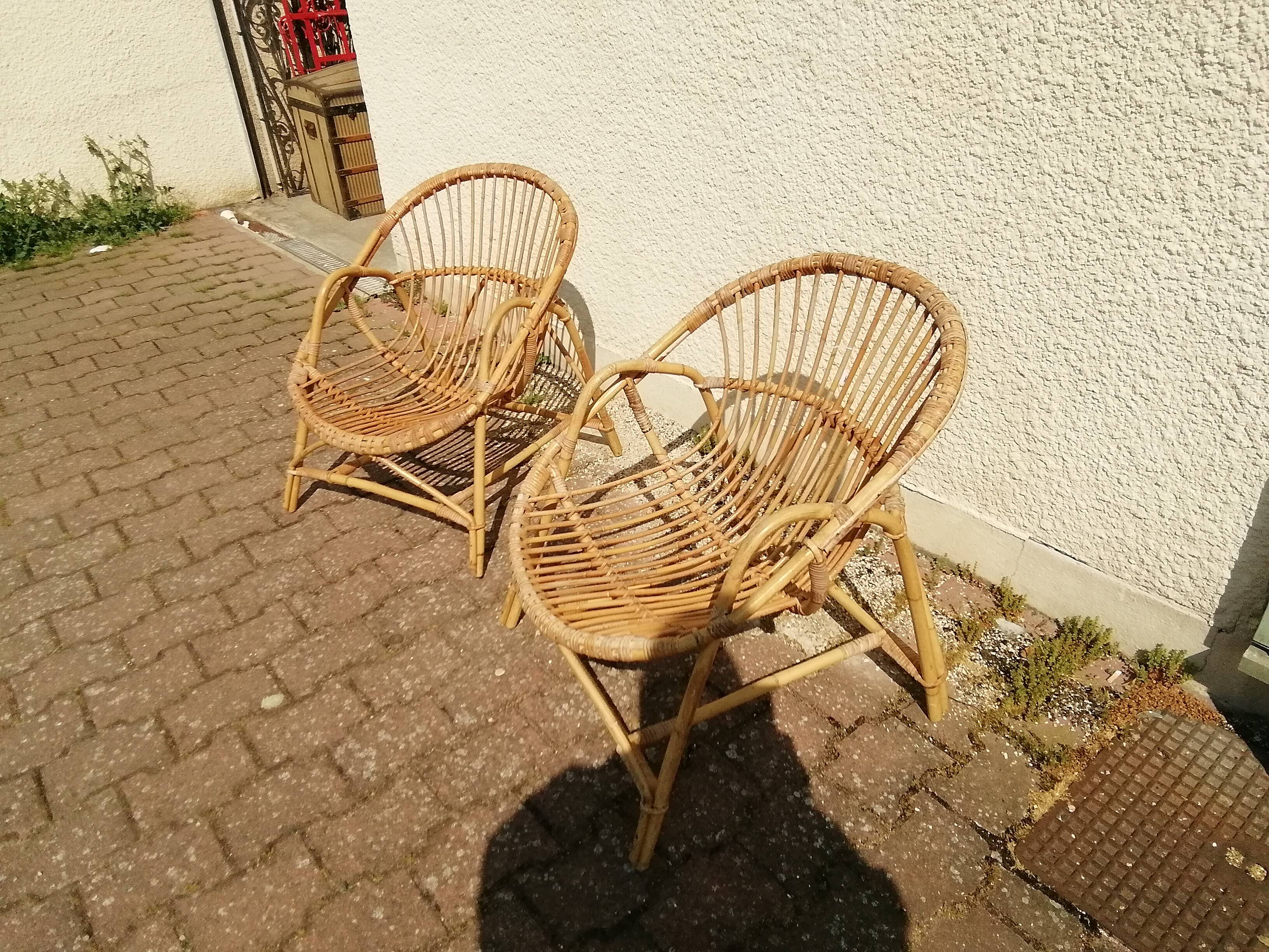 Vintage rattan armchair pair