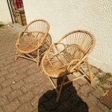 Vintage rattan armchair pair