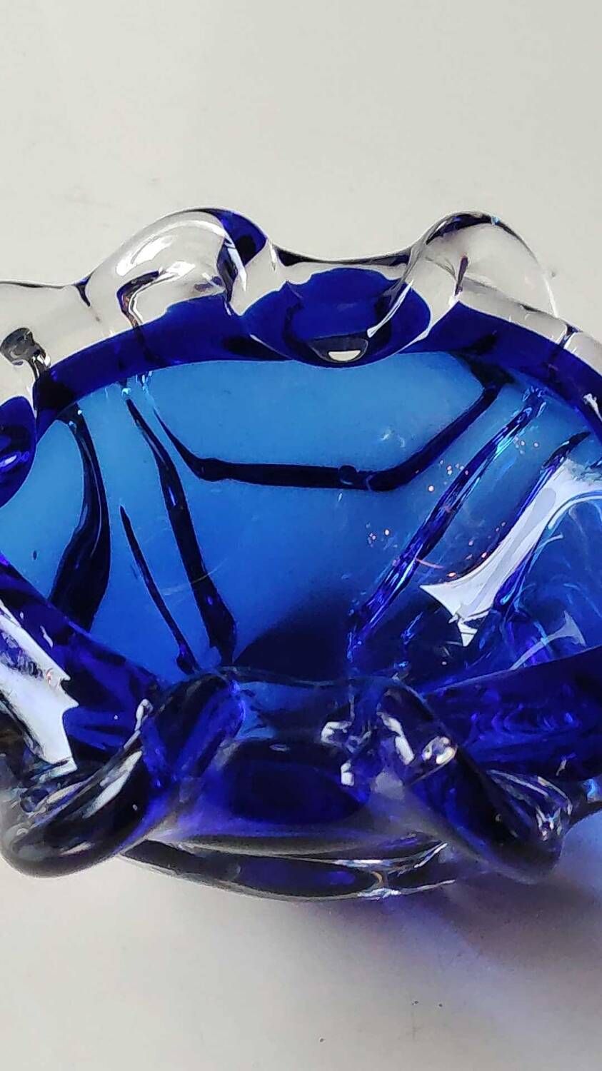 Empty pocket blown art glass from Murano Italy, corolla shape, cobalt blue